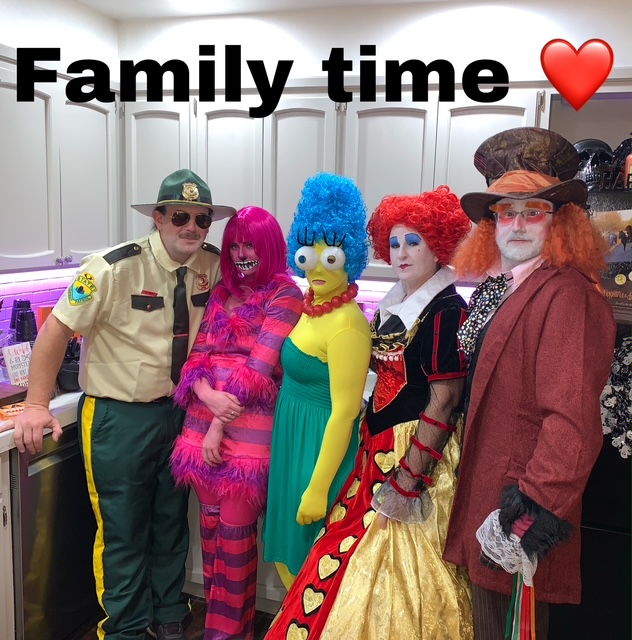 Tammi and her family dressed in Halloween costumes